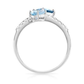 Ring in 375 witgoud met behandelde blauwe topazen