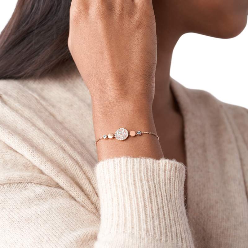 Bracelet FOSSIL acier inoxydable doré rose nacres et strass. - vue porté 1