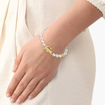 Bracelet LACOSTE matchpoint acier doré perles longueur 16 cm - vue porté 1