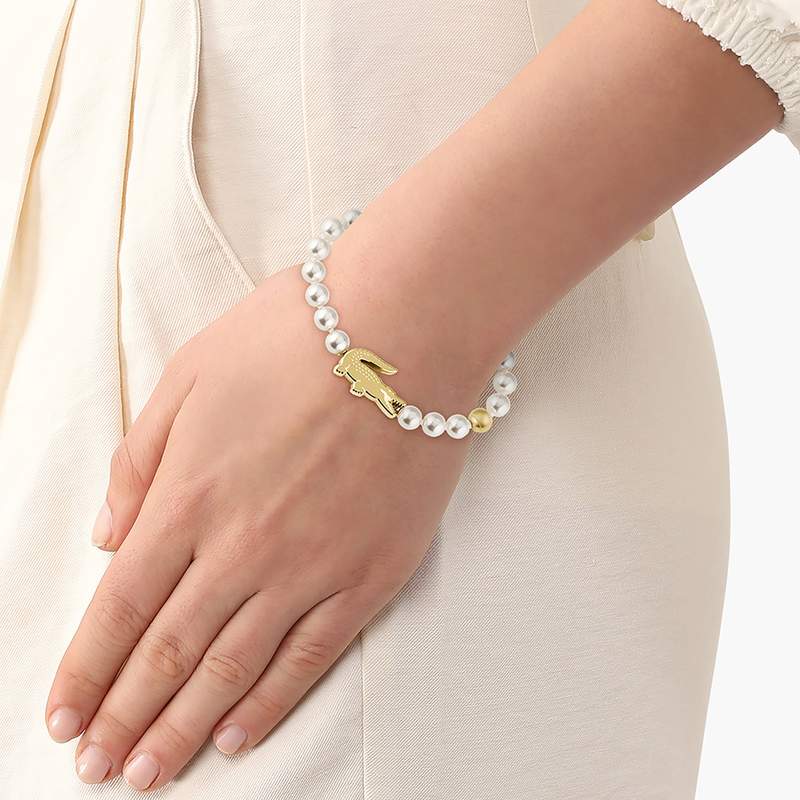 Bracelet LACOSTE matchpoint acier doré perles longueur 16 cm - vue porté 1