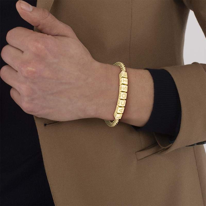 Bracelet LACOSTE SCRIPT acier inoxydable doré - vue porté 1