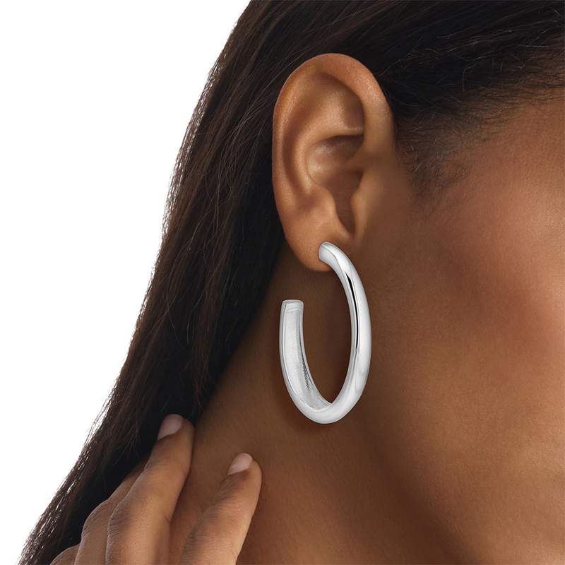 Boucles d'oreilles CALVIN KLEIN DISTINCTIVE ICONS acier - vue porté 1
