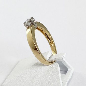 Tweedehands 750 geelgouden en diamanten ring