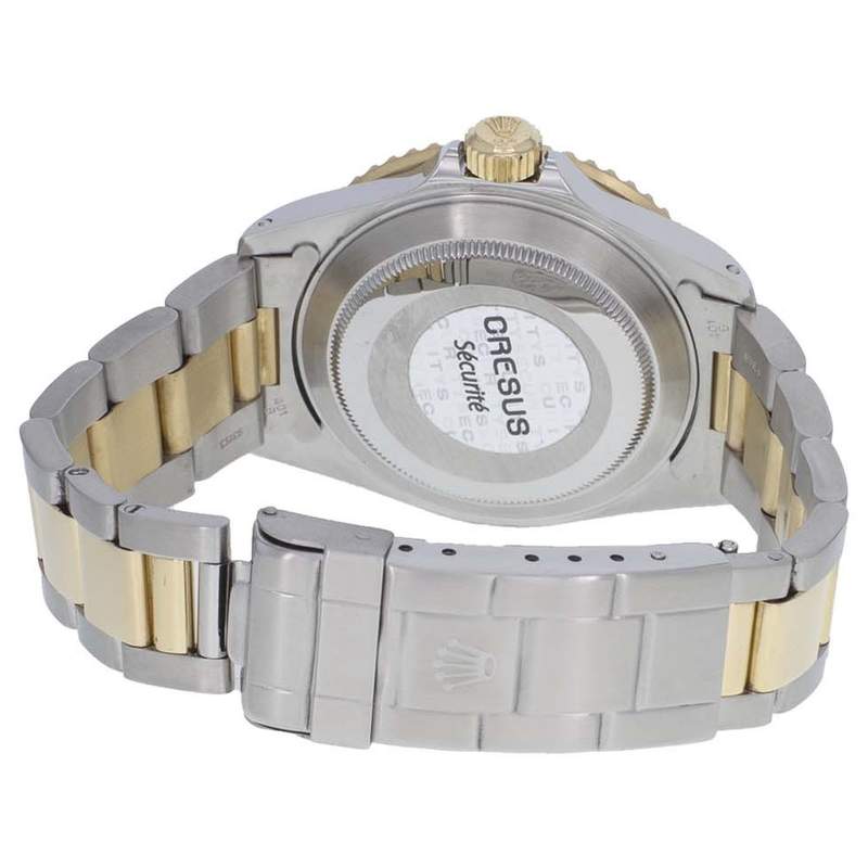 Montre d'occasion Rolex Submariner homme automatique or 750 jaune et acier - vue 3