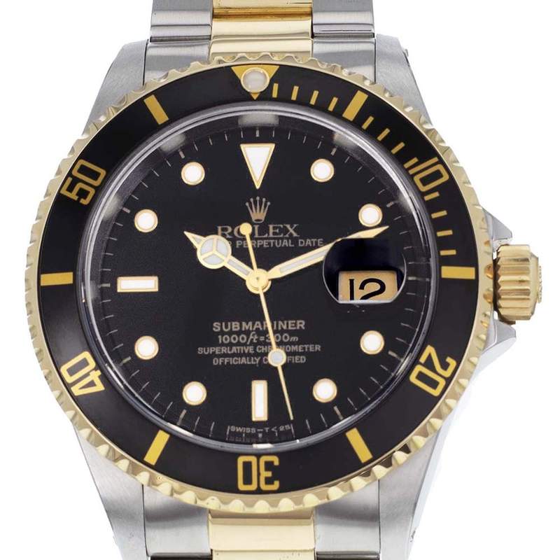 Montre d'occasion Rolex Submariner homme automatique or 750 jaune et acier - vue D1