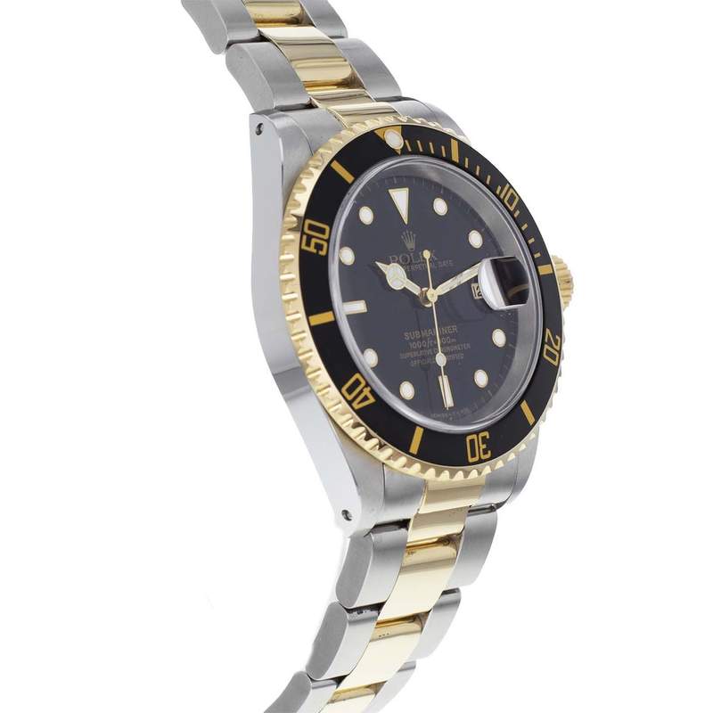 Montre d'occasion Rolex Submariner homme automatique or 750 jaune et acier - vue D2