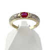 Bague d'occasion 2 ors 750 rubis et diamants - vue V1