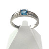 Bague d'occasion or 375 blanc topaze bleue traitée et diamants - vue V1