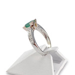 Bague d'occasion 2 ors 750 émeraudes diamants - vue 2