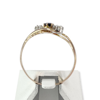 Tweedehands gouden ring 750 2 toon saffier diamant