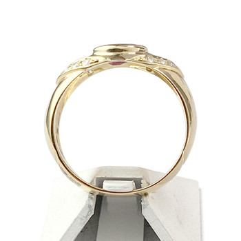 Tweedehands gouden ring 750 gele robijn diamant