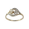Bague d'occasion or 750 jaune et rhodié diamants perle fine - vue V1