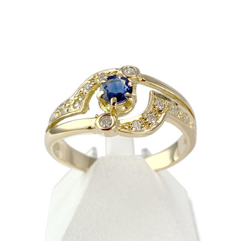 Tweedehands goud 750 gele saffier diamanten ring