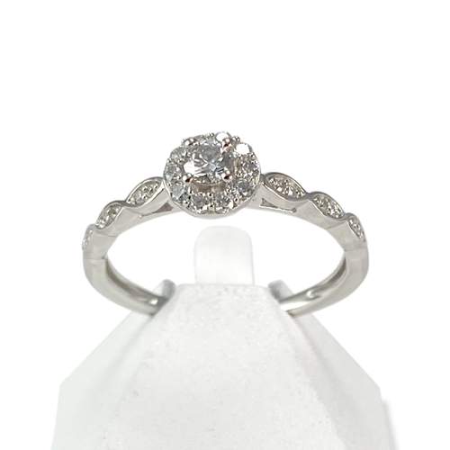 Tweedehands goud 750 witte diamanten ring