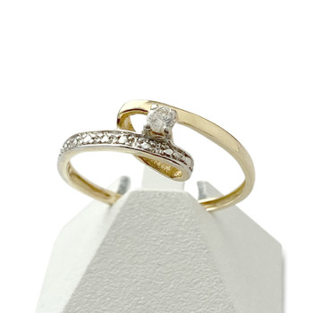 Tweedehands 750 geelgouden en gerhodineerde zirkonia ring