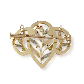 Broche d'occasion 2 ors 750 diamants verres rouges