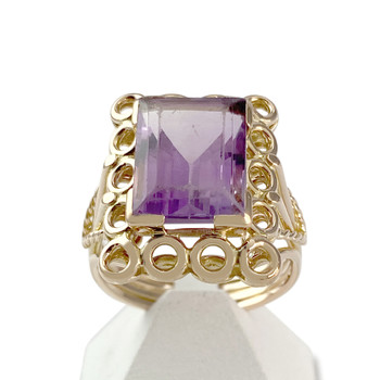 Tweedehands gouden ring 750 gele amethist