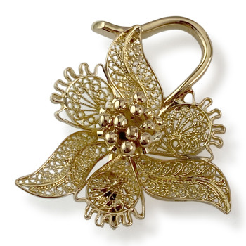 Broche d'occasion en or 750 fleur