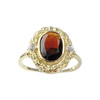 Bague d'occasion or 750 jaune diamants et grenat - vue V1