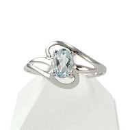 Bague d'occasion or 750 blanc topaze bleue traitée