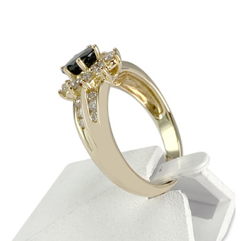 Tweedehands goud 750 gele saffier diamanten ring