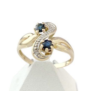 Bague d'occasion 2 ors 750 saphirs diamants