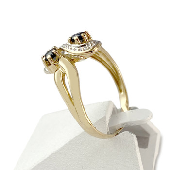 Bague d'occasion 2 ors 750 saphirs diamants