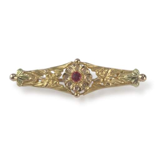 Broche d'occasion or 750 jaune doublet grenat verre
