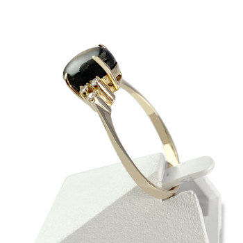 Bague d'occasion or 585 jaune saphir noir étoilé diamants