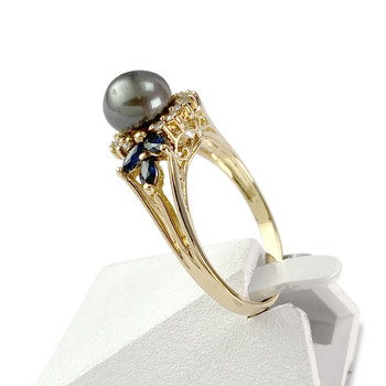 Tweedehands gouden 750 geel gekweekte parel diamant saffier ring