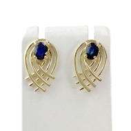 Boucles d'oreilles clous d'occasion or 750 jaune saphirs