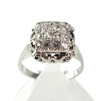 Tweedehands ring goud 750 wit synthetische stenen