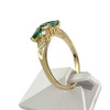 Bague d'occasion or 750 jaune émeraudes diamants - vue V2