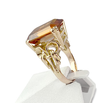 Tweedehands gouden ring 750 geel synthetisch korund