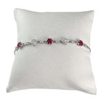Tweedehands armband van 750 witgoud met Engelse schakels, diamanten en robijnen, 19 cm - afbeelding 1