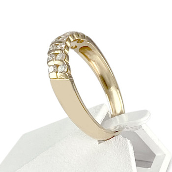 Tweedehands halfronde ring in 750 geelgoud met diamanten