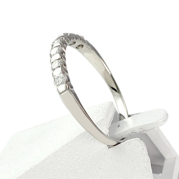 Tweedehands halfronde ring in 750 witgoud met diamanten