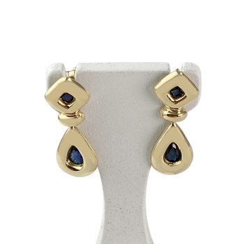 Boucles d'oreilles clous d'occasion or 750 jaune saphirs
