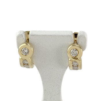 Second-hand half hoop earrings in gold 750 diamonds