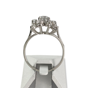 Tweedehands ring goud 750 wit synthetische stenen