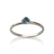Bague d'occasion or 750 blanc topaze bleue