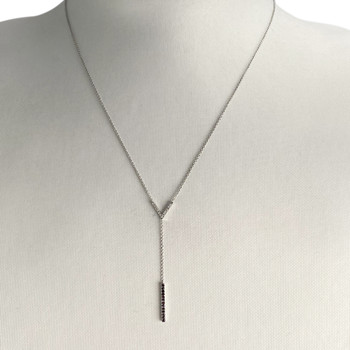 Collier d'occasion or 375 blanc maille forçat diamants blancs et noirs traités 42 cm