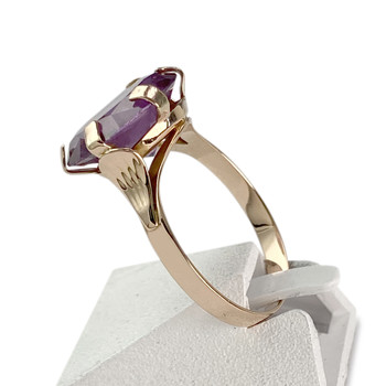Bague d'occasion or 750 jaune corindon synthétique violet