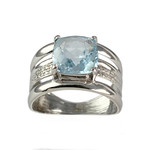 Tweedehands ring van 750 witgoud met een behandelde blauwe topaas en diamanten - afbeelding 1