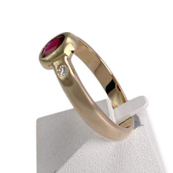 Bague d'occasion or 750 jaune diamants pierres rouges