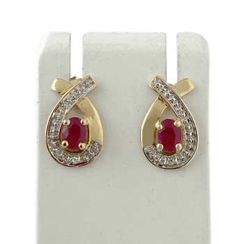 Boucles d'oreilles clous d'occasion or 750 2 tons rubis diamants