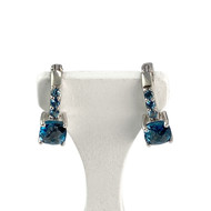 Boucles d'oreilles or 375 blanc topazes bleues traitées