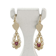 Boucles d'oreilles pendants d'occasion or 750 jaune rubis