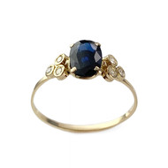 Tweedehands goud 750 gele saffier diamanten ring