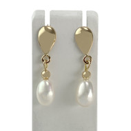 Boucles d'oreilles d'occasion or 750 jaune perle de culture de chine
